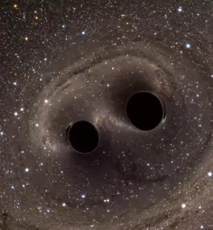 Frame from a computer simulation of a black hole binary system spiralling around each other and deforming the surrounding spacetime.